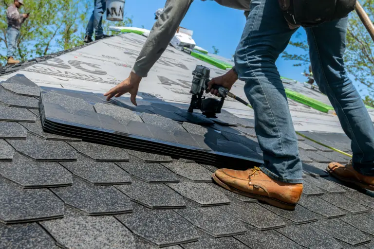 roofer installing roofing tiles